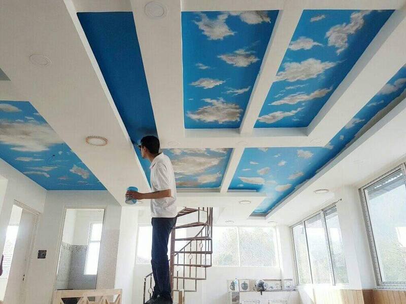 Realistic sky and clouds painted on ceiling panels
